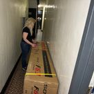 Slicing away at the straps from the packaging.JPG